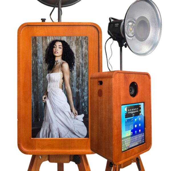 Adore wooden photo booth with professional flash and tripod at a luxury wedding event venue by Photo Booth Bay.
